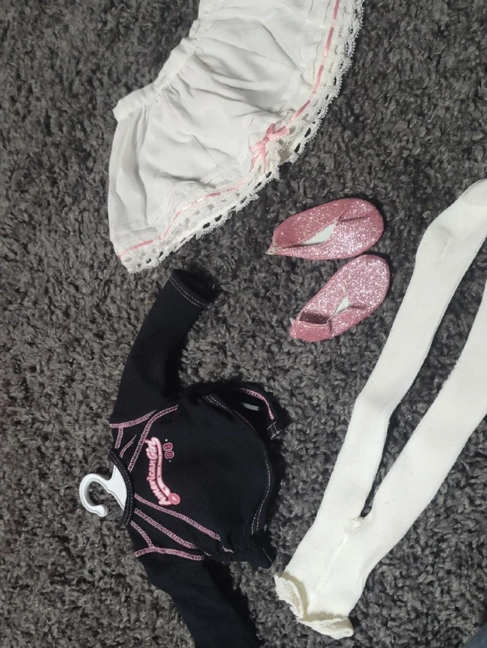 American Girl Black Top with Pink Logo and White Tights And Shoes And A Skirt